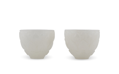 A PAIR OF WHITE GLASS 'LOTUS' CUPS QING DYNASTY, 18TH CENTURY