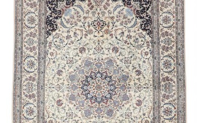 A Persian Nain carpet with silk, medallion design with twisted branches, flowers...