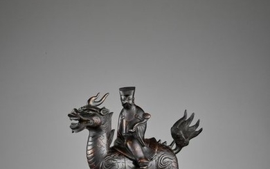 A ‘QILIN AND DIGNITARY’ BRONZE CENSER, QING
