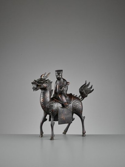 A ‘QILIN AND DIGNITARY’ BRONZE CENSER, QING
