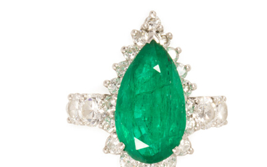 A Retro emerald, diamond and platinum ring