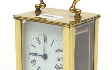 A SMALL BRASS CASED CARRIAGE CLOCK, THE DIAL SIGNED STEWART DAWSON & CO., LONDON, WITH KEY, 14 CM HIGH