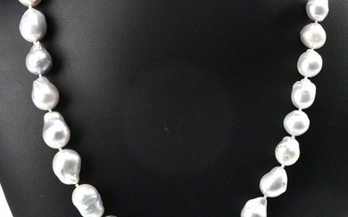 A STRAND OF THIRTY FIVE SOUTH SEA PEARLS TO A STERLING SILVER CLASP