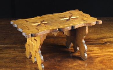 A Small & Decorative Welsh Boarded Oak Stool with parquetry inlay. The serpentine edged rectangular