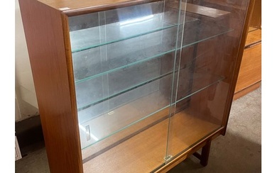 A Turnidge of London teak display cabinet