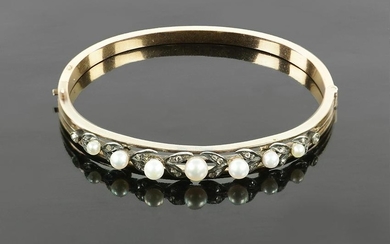 A Victorian Pearl & Diamond Bangle Bracelet.