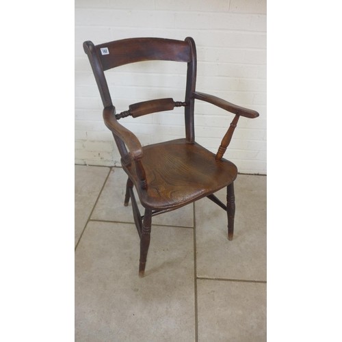 A Victorian ash and elm open armchair