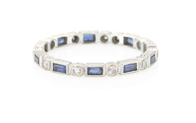 A WHITE GOLD, SAPPHIRE AND DIAMOND RING