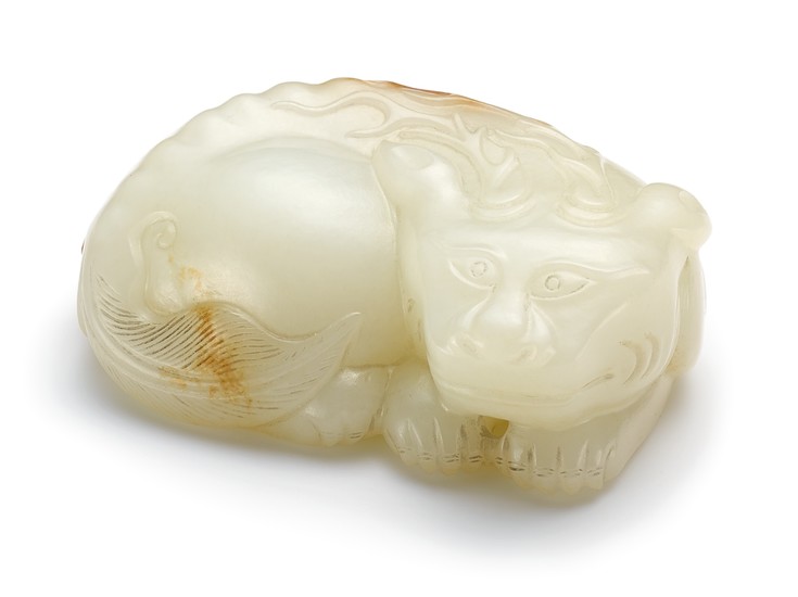A WHITE JADE FIGURE OF A MYTHICAL BEAST QING DYNASTY, 18TH CENTURY