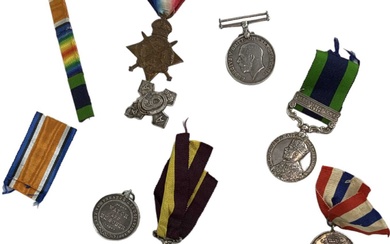 A WWI medal trio awarded to 'DVR. A.E. Shelly. R.F.A'...