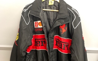 A black Ferrari motor racing jacket.