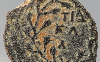 A bronze prutah of Valerius Gratus, procurator of Judea...