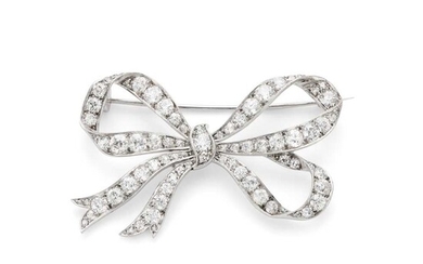 A diamond bow brooch