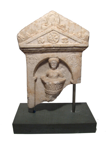 A fantastic Roman marble funerary stele