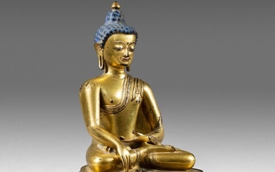 A gilt-copper alloy figure of Buddha Shakyamuni Tibet, ca. 14th-15th century | 西藏 約十四至十五世紀 鎏金銅合金佛坐像