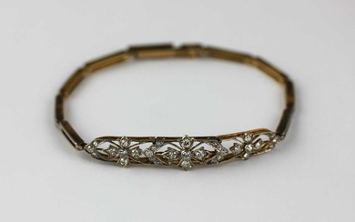 A gold and platinum fronted diamond bracelet