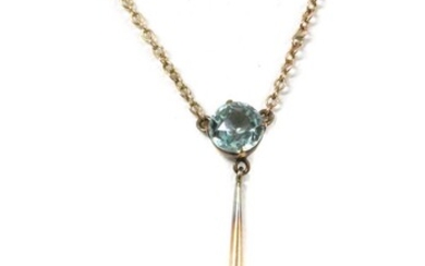 A gold aquamarine Edna May pendant