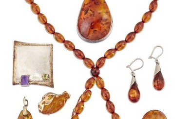 A group of amber jewellery, including: a heat treated amber panel necklace, two pendants, ring, brooch, necklace and earrings; (necklace detached); and an amethyst and peridot brooch (a lot)