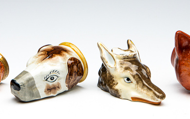 A group of early ceramic dog heads including Staffordshire (H:12cm-tallest)...