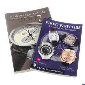 A group of watch price reference books and watch related magazines. Approximately 100.