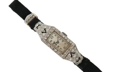 A lady's Art Deco diamond wristwatch, the plain...