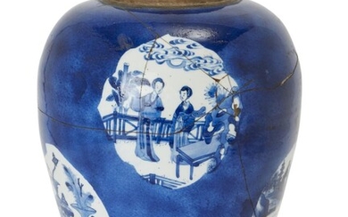A large Chinese powder blue jar, Kangxi period, painted in underglaze blue with cartouches of landscape, ladies in garden, antique objects, underglaze blue double circle to the underside, 30cm high 清康熙 灑藍地青花繪仕女博古圖紋大罐