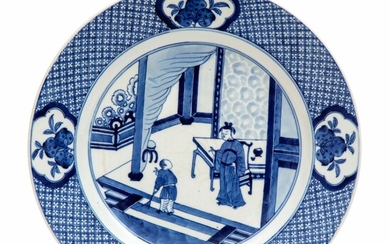 A large blue and white soft paste plate