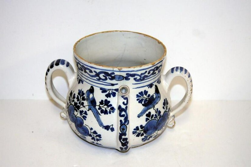 A late 17th century London delft posset pot decorated