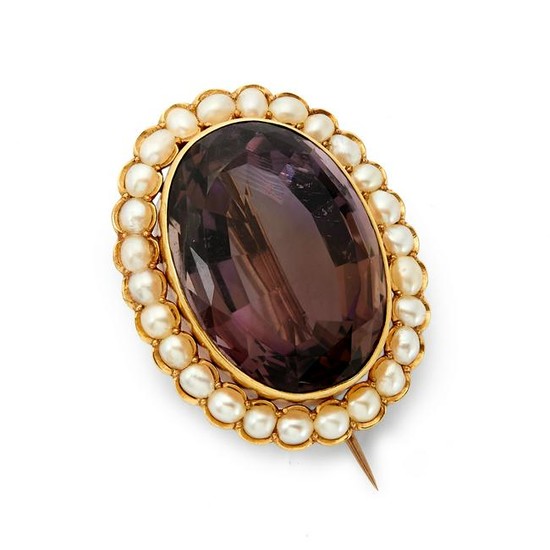 A late 19th century amethyst and split pearl brooch.
