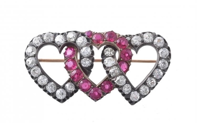 A late 19th century diamond and synthetic ruby triple heart brooch
