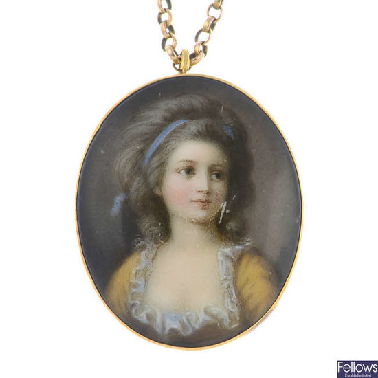A late 19th century transfer printed portrait pendant, suspended from a chain.