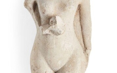 A limestone statue of an Amarna style princess, naked with her left leg forward, holding an unguent jar in her right hand before her, Not Ancient, 17.4cm high Provenance: Formerly in the private collection of Werner Forman (1921-2010)