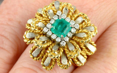 A mid 20th century emerald and diamond bi-colour floral cluster ring.