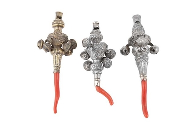 A mixed group of William IV / Victorian sterling silver and coral baby’s rattles