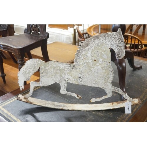 A painted iron rocking horse ornament, length 75cm ...