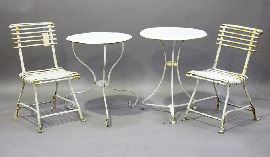 A pair of 20th century French white painted wrought iron garden chairs, height 79cm, width 41cm, tog