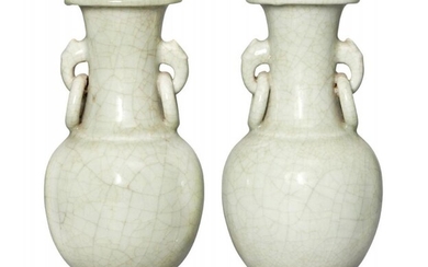 A pair of Chinese celadon porcelain vases,...