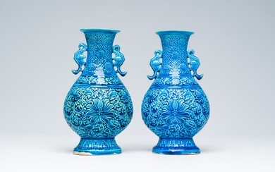 A pair of Chinese turquoise glazed 'lotus' vases, Republic, 20th C.