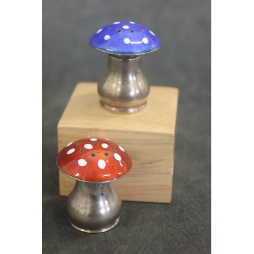 A pair of Norwegian silver and enamelled mushroom shaped pep...