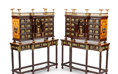 A pair of Spanish baroque style gilt metal mounted inlaid cabinets on stands