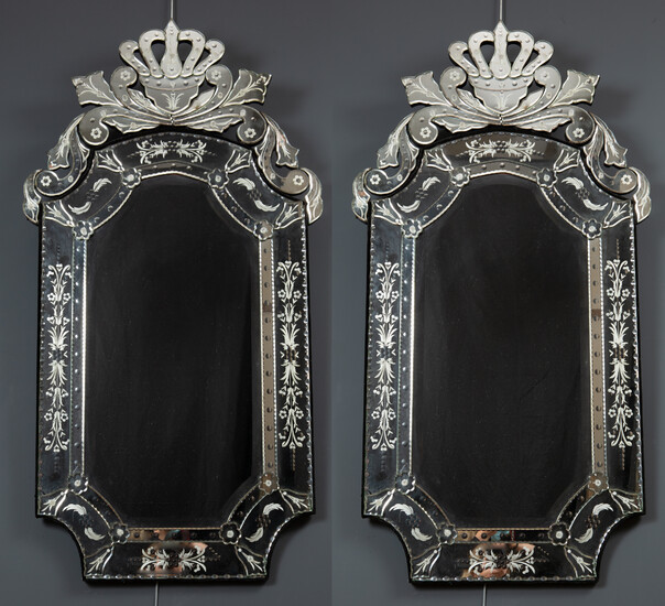 A pair of Venetian style wall mirrors