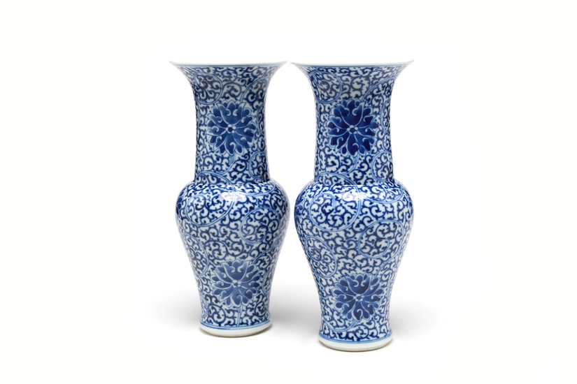 A pair of blue and white porcelain vases painted with stylized scrolling lotus pattern