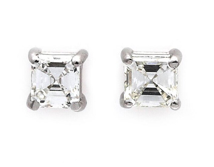 SOLD. A pair of ear studs each set with a carré-cut diamond weighing a total of app. 0.46 ct., mounted in 14k white gold. (2) – Bruun Rasmussen Auctioneers of Fine Art
