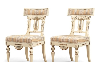 A pair of late Gustavian early 19th century chairs in the manner of Carl Christoffer Gjörwell (1766-1837).