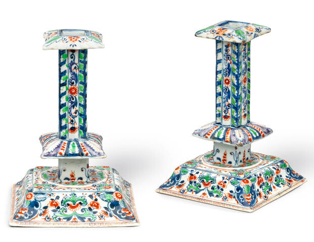 A pair of rare Delft-style famille verte silver-shaped candlesticks