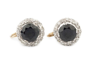 A pair of sapphire and diamond ear clips of cluster...