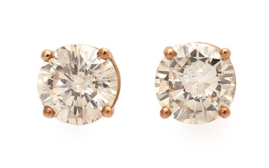 SOLD. A pair of solitaire diamond ear studs each set with a brilliant-cut diamonds weighing a total of app. 1.76 ct., mounted in 14k rose gold. (2) – Bruun Rasmussen Auctioneers of Fine Art
