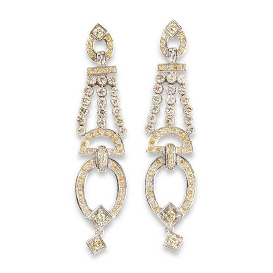 A pair of yellow diamond, diamond and platinum earrings