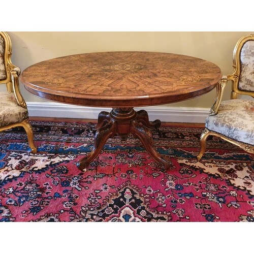 A really good Victorian Walnut Inlaid oval Centre Table with...