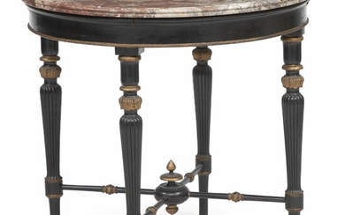 NOT SOLD. A round Empire style ebonized and giltwood occasional table. C. 1920. Marble top presumably France, early 19th century. H. 77 cm. Diam. 82 cm. – Bruun Rasmussen Auctioneers of Fine Art